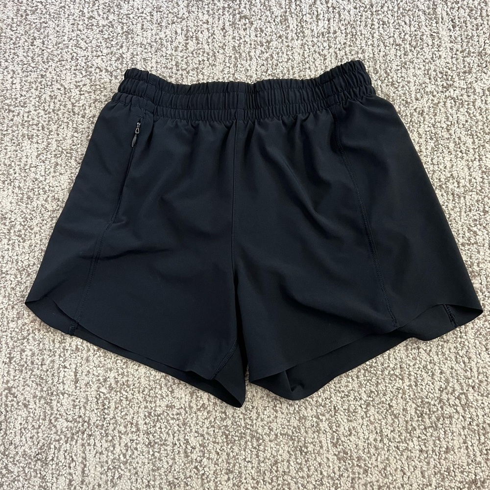 ATHLETA GIRL HEART THE HUSTLE 4” SHORT- size L/12 (youth)